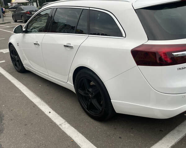 Белый Опель Инсигния, объемом двигателя 2.01 л и пробегом 201 тыс. км за 13500 $, фото 22 на Automoto.ua