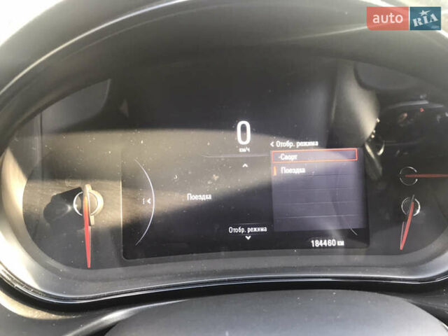 Білий Опель Інсігнія, об'ємом двигуна 2 л та пробігом 210 тис. км за 10800 $, фото 36 на Automoto.ua