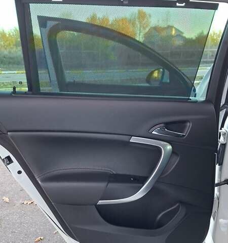 Белый Опель Инсигния, объемом двигателя 1.96 л и пробегом 246 тыс. км за 12800 $, фото 24 на Automoto.ua