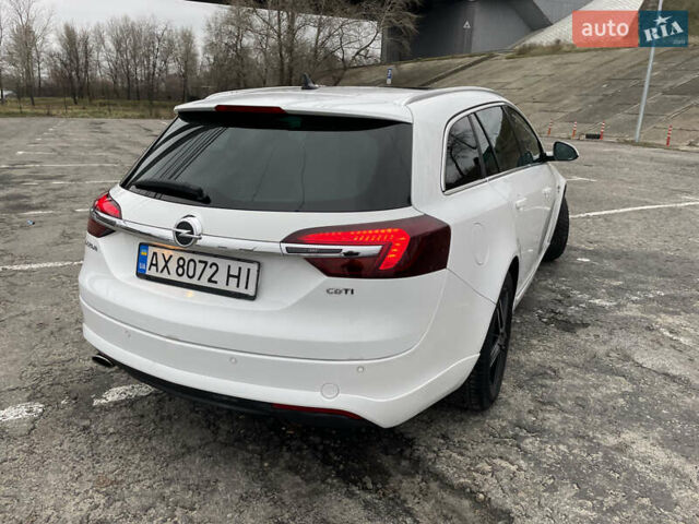 Білий Опель Інсігнія, об'ємом двигуна 1.96 л та пробігом 298 тис. км за 10800 $, фото 7 на Automoto.ua