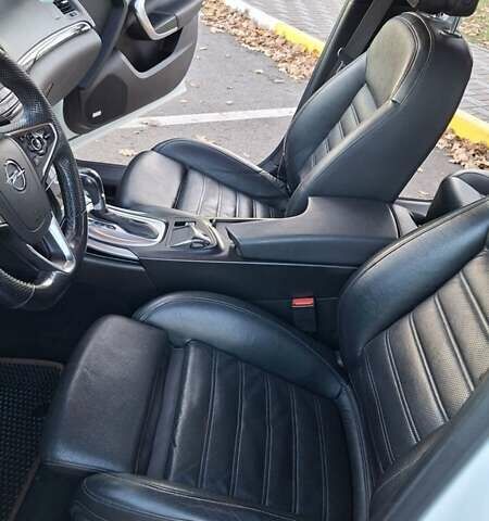 Белый Опель Инсигния, объемом двигателя 1.96 л и пробегом 246 тыс. км за 12800 $, фото 25 на Automoto.ua