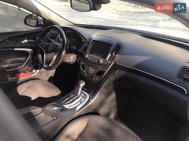 Білий Опель Інсігнія, об'ємом двигуна 2 л та пробігом 210 тис. км за 10800 $, фото 27 на Automoto.ua