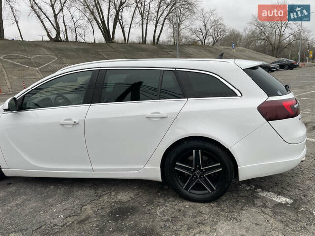 Білий Опель Інсігнія, об'ємом двигуна 1.96 л та пробігом 298 тис. км за 10800 $, фото 5 на Automoto.ua