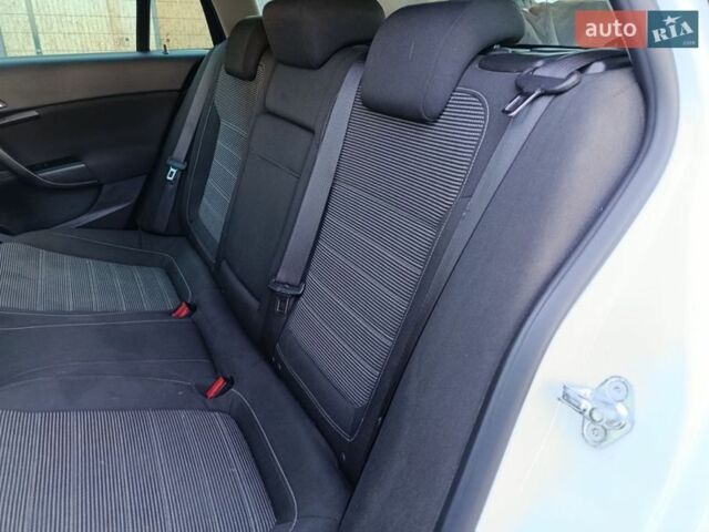 Белый Опель Инсигния, объемом двигателя 2 л и пробегом 280 тыс. км за 8450 $, фото 34 на Automoto.ua