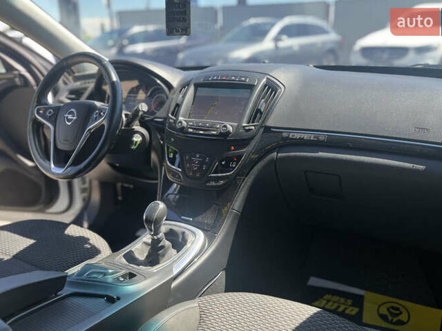 Білий Опель Інсігнія, об'ємом двигуна 2 л та пробігом 334 тис. км за 9150 $, фото 23 на Automoto.ua