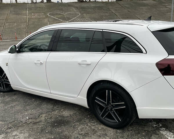 Білий Опель Інсігнія, об'ємом двигуна 1.96 л та пробігом 298 тис. км за 10800 $, фото 21 на Automoto.ua