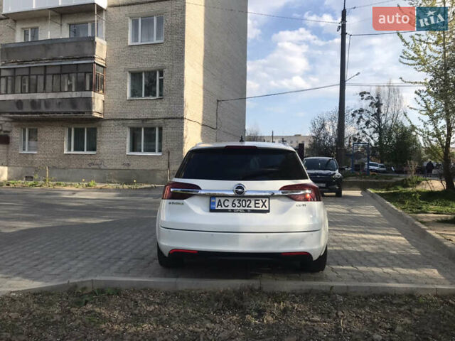 Білий Опель Інсігнія, об'ємом двигуна 2 л та пробігом 210 тис. км за 10800 $, фото 9 на Automoto.ua