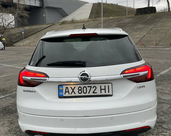 Білий Опель Інсігнія, об'ємом двигуна 1.96 л та пробігом 298 тис. км за 10800 $, фото 24 на Automoto.ua