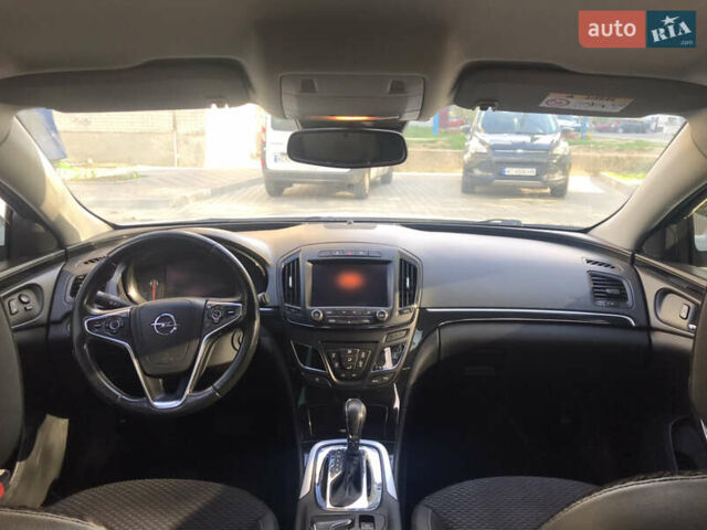 Білий Опель Інсігнія, об'ємом двигуна 2 л та пробігом 210 тис. км за 10800 $, фото 25 на Automoto.ua