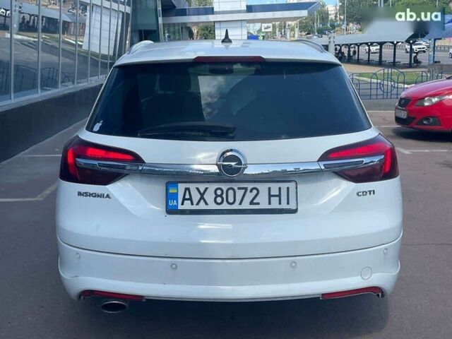 Белый Опель Инсигния, объемом двигателя 2 л и пробегом 297 тыс. км за 10700 $, фото 6 на Automoto.ua