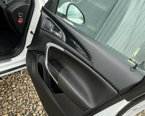 Білий Опель Інсігнія, об'ємом двигуна 2 л та пробігом 191 тис. км за 8200 $, фото 29 на Automoto.ua