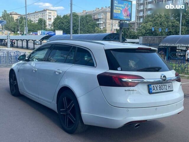 Белый Опель Инсигния, объемом двигателя 2 л и пробегом 297 тыс. км за 10700 $, фото 5 на Automoto.ua