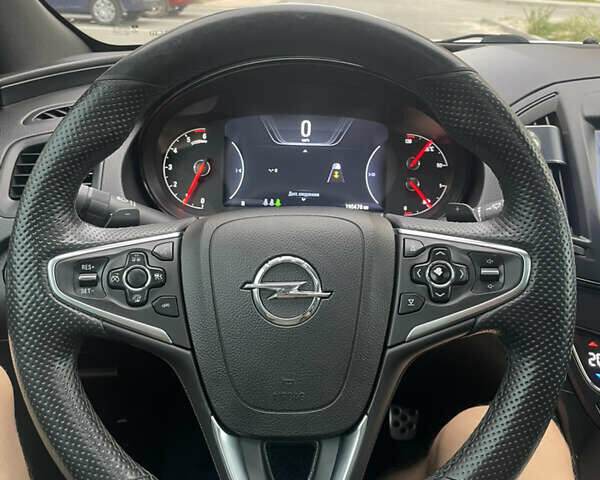 Білий Опель Інсігнія, об'ємом двигуна 2 л та пробігом 200 тис. км за 12500 $, фото 18 на Automoto.ua