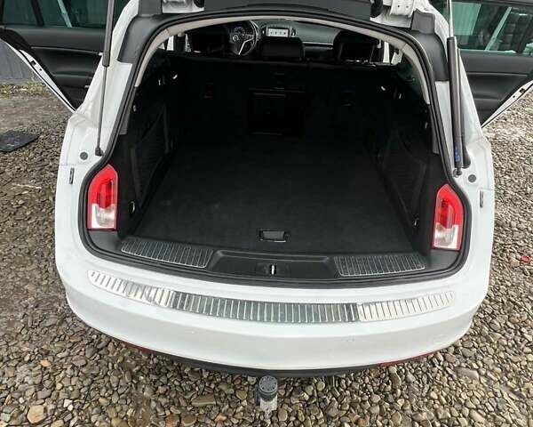 Білий Опель Інсігнія, об'ємом двигуна 2 л та пробігом 191 тис. км за 8200 $, фото 21 на Automoto.ua