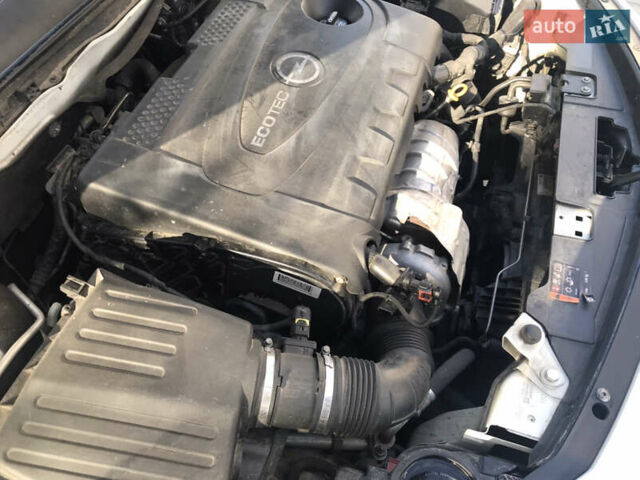 Білий Опель Інсігнія, об'ємом двигуна 2 л та пробігом 210 тис. км за 10800 $, фото 31 на Automoto.ua