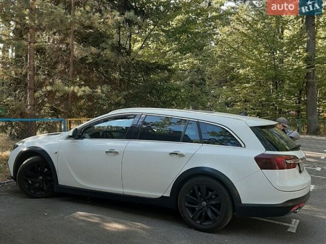 Білий Опель Інсігнія, об'ємом двигуна 1.96 л та пробігом 200 тис. км за 15270 $, фото 14 на Automoto.ua