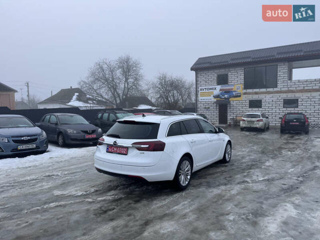 Білий Опель Інсігнія, об'ємом двигуна 2 л та пробігом 230 тис. км за 9600 $, фото 10 на Automoto.ua