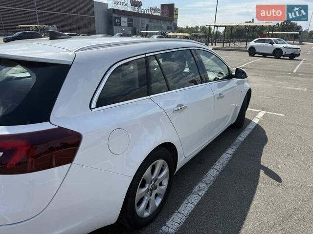 Белый Опель Инсигния, объемом двигателя 1.96 л и пробегом 295 тыс. км за 12000 $, фото 4 на Automoto.ua