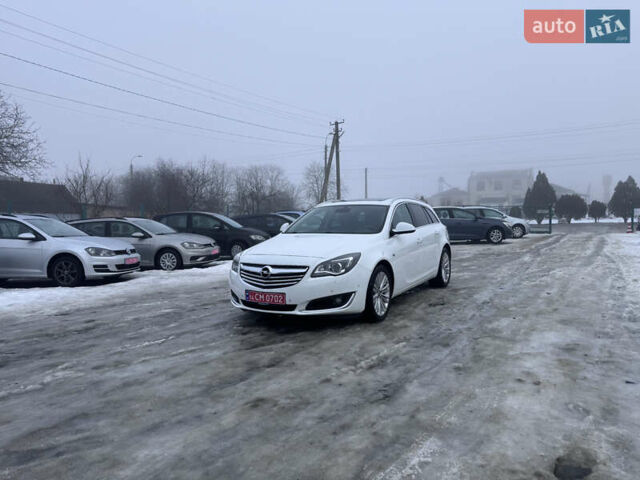 Білий Опель Інсігнія, об'ємом двигуна 2 л та пробігом 230 тис. км за 9600 $, фото 1 на Automoto.ua