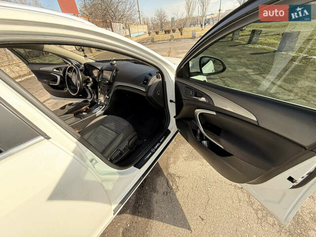 Білий Опель Інсігнія, об'ємом двигуна 2 л та пробігом 221 тис. км за 11600 $, фото 13 на Automoto.ua