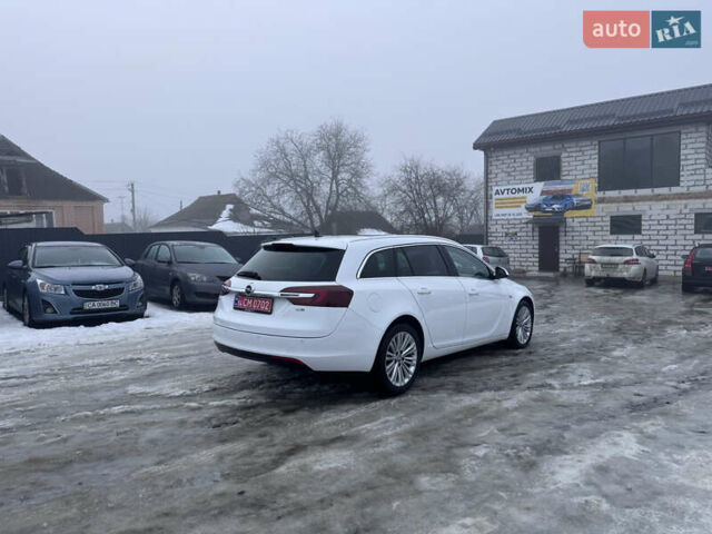 Білий Опель Інсігнія, об'ємом двигуна 2 л та пробігом 230 тис. км за 9600 $, фото 9 на Automoto.ua