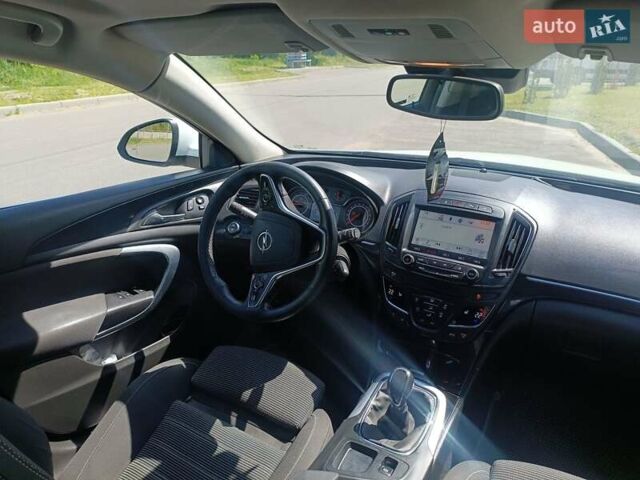 Белый Опель Инсигния, объемом двигателя 1.6 л и пробегом 170 тыс. км за 9900 $, фото 4 на Automoto.ua