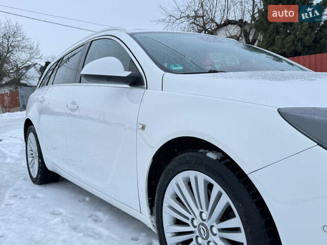 Белый Опель Инсигния, объемом двигателя 2 л и пробегом 248 тыс. км за 10650 $, фото 17 на Automoto.ua