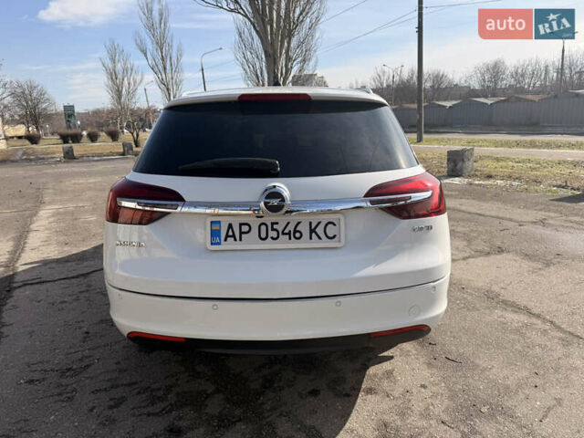Білий Опель Інсігнія, об'ємом двигуна 2 л та пробігом 221 тис. км за 11600 $, фото 4 на Automoto.ua