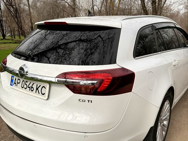 Білий Опель Інсігнія, об'ємом двигуна 2 л та пробігом 224 тис. км за 10999 $, фото 5 на Automoto.ua
