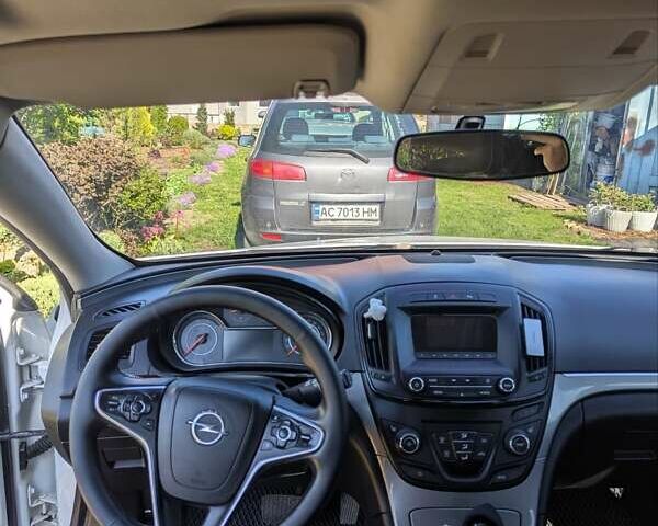 Білий Опель Інсігнія, об'ємом двигуна 1.96 л та пробігом 230 тис. км за 10500 $, фото 9 на Automoto.ua
