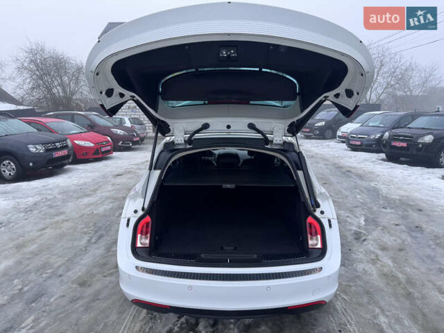 Білий Опель Інсігнія, об'ємом двигуна 2 л та пробігом 230 тис. км за 9600 $, фото 48 на Automoto.ua