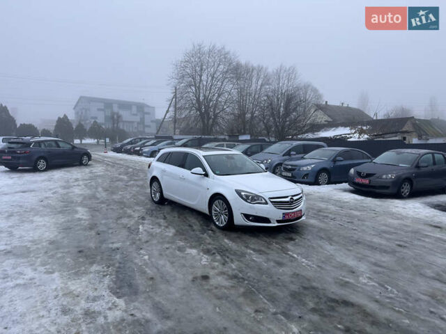 Білий Опель Інсігнія, об'ємом двигуна 2 л та пробігом 230 тис. км за 9600 $, фото 22 на Automoto.ua