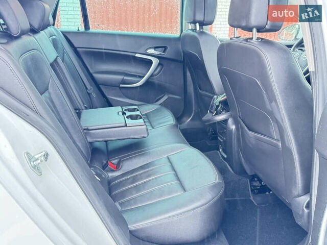 Белый Опель Инсигния, объемом двигателя 2 л и пробегом 248 тыс. км за 10650 $, фото 42 на Automoto.ua