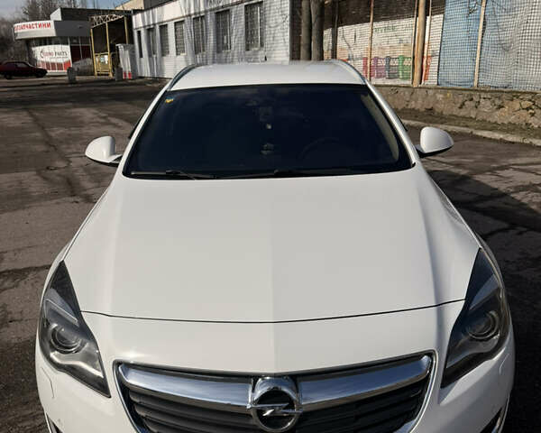 Білий Опель Інсігнія, об'ємом двигуна 2 л та пробігом 221 тис. км за 11600 $, фото 6 на Automoto.ua