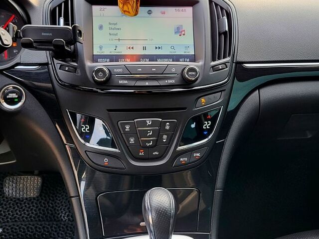 Білий Опель Інсігнія, об'ємом двигуна 2 л та пробігом 201 тис. км за 12450 $, фото 4 на Automoto.ua