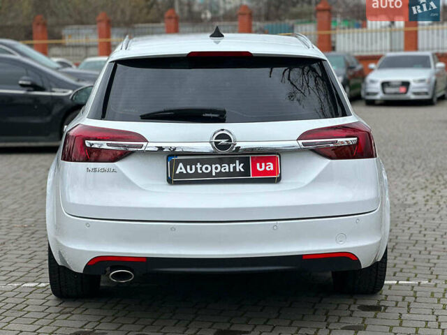 Білий Опель Інсігнія, об'ємом двигуна 2 л та пробігом 198 тис. км за 10490 $, фото 4 на Automoto.ua