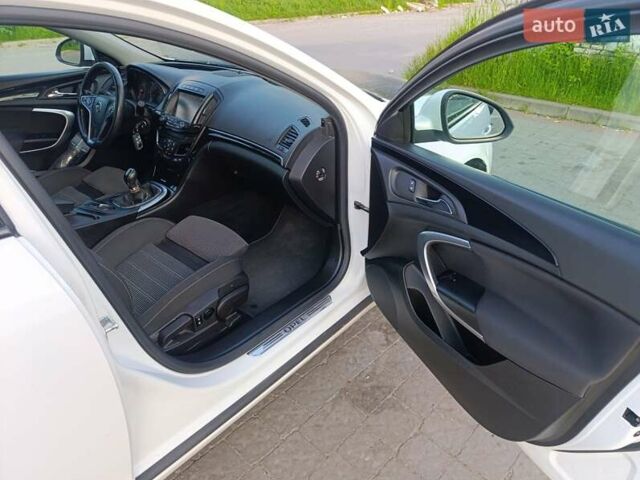 Белый Опель Инсигния, объемом двигателя 2 л и пробегом 248 тыс. км за 9650 $, фото 23 на Automoto.ua