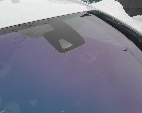 Білий Опель Інсігнія, об'ємом двигуна 1.96 л та пробігом 226 тис. км за 11100 $, фото 13 на Automoto.ua