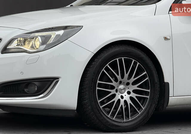 Белый Опель Инсигния, объемом двигателя 1.96 л и пробегом 241 тыс. км за 9800 $, фото 14 на Automoto.ua