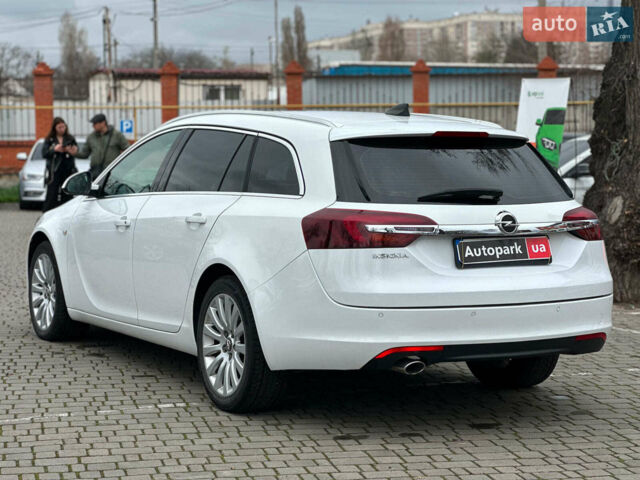 Белый Опель Инсигния, объемом двигателя 2 л и пробегом 200 тыс. км за 8590 $, фото 5 на Automoto.ua