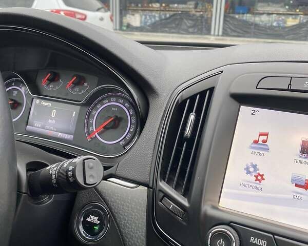 Білий Опель Інсігнія, об'ємом двигуна 1.6 л та пробігом 239 тис. км за 11300 $, фото 26 на Automoto.ua