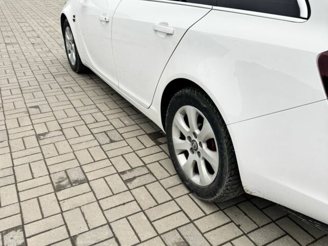 Білий Опель Інсігнія, об'ємом двигуна 2 л та пробігом 279 тис. км за 11700 $, фото 2 на Automoto.ua