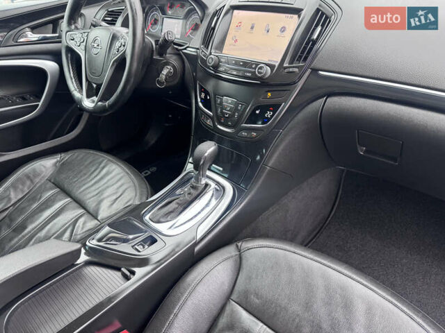 Білий Опель Інсігнія, об'ємом двигуна 2 л та пробігом 230 тис. км за 9600 $, фото 41 на Automoto.ua