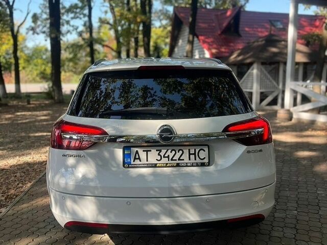 Білий Опель Інсігнія, об'ємом двигуна 2 л та пробігом 265 тис. км за 8200 $, фото 5 на Automoto.ua