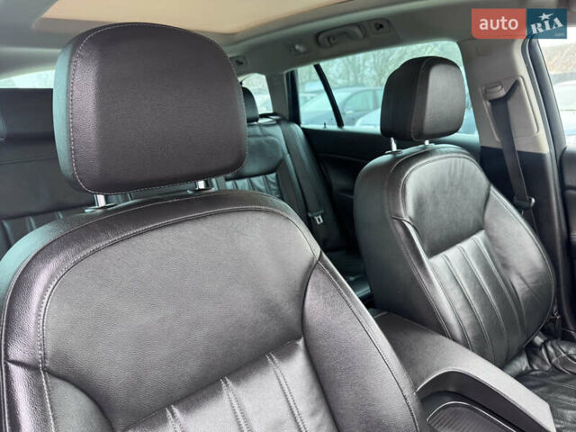 Білий Опель Інсігнія, об'ємом двигуна 2 л та пробігом 230 тис. км за 9600 $, фото 45 на Automoto.ua