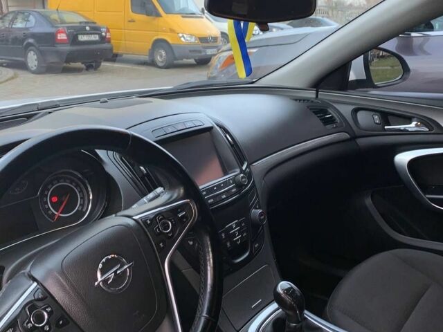 Білий Опель Інсігнія, об'ємом двигуна 2 л та пробігом 264 тис. км за 8022 $, фото 5 на Automoto.ua