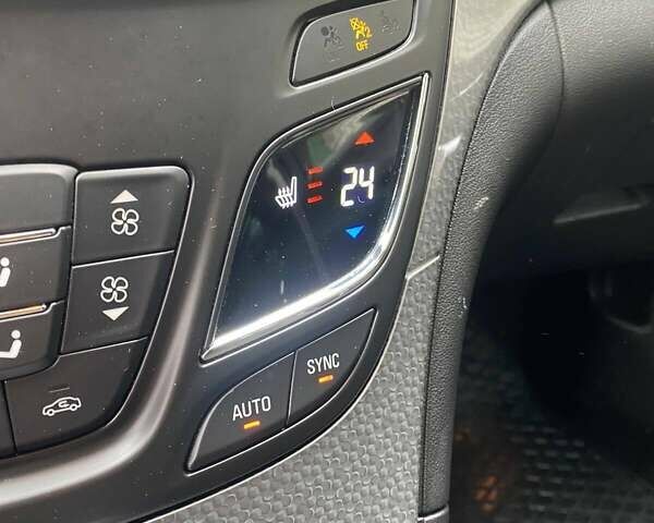 Білий Опель Інсігнія, об'ємом двигуна 1.6 л та пробігом 239 тис. км за 11300 $, фото 5 на Automoto.ua