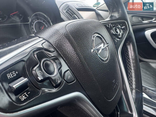 Білий Опель Інсігнія, об'ємом двигуна 2 л та пробігом 230 тис. км за 9600 $, фото 33 на Automoto.ua