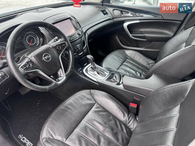 Білий Опель Інсігнія, об'ємом двигуна 2 л та пробігом 230 тис. км за 9600 $, фото 31 на Automoto.ua