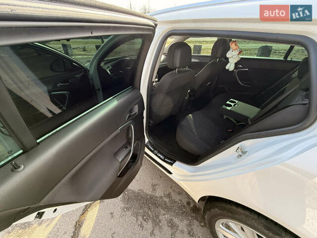 Білий Опель Інсігнія, об'ємом двигуна 2 л та пробігом 221 тис. км за 11600 $, фото 10 на Automoto.ua